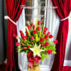 &ldquo;A striking vase arrangement featuring a luxurious display of vibrant red roses