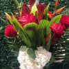 birds of paradise, ginger, premium tropicals and red roses with white hydrangea
