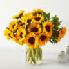 Featuring a lush bouquet of golden sunflowers complemented by soft greenary, this
