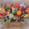 Embrace the spirit of fall with this stunning arrangement, featuring a vibrant