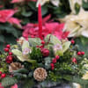 This elegant decorative centerpiece features a luxurious blend of natural and festive