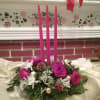 Red, white flowers with pine cones and glass balls can be used