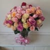 Beautiful all shades of pink 100 roses in a hand tied bouquet