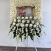 The Divine Grace Wreath is a heartfelt tribute, symbolizing faith, purity, and