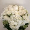 White Roses and White Hydrangea in a leaf lined cube