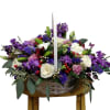 Elevate your gifting experience with our exquisite purple posies basket arrangement, bursting