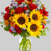 A sunny sunflower arrangement gets an autumnal spin with the addition of