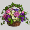 Lush flowers to celebrate a full life. This beautiful basket of flowers