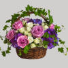 Lush flowers to celebrate a full life. This beautiful basket of flowers