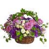 Lush flowers to celebrate a full life. This beautiful basket of flowers