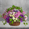 Lush flowers to celebrate a full life. This beautiful basket of flowers