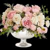 Illuminate love with embracing soft pastel shimmer and cradling an exquisite arrangement