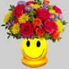 Happiness, delivered! Colorful roses in a cheerful ceramic planter are the quickest