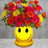 Happiness, delivered! Colorful roses in a cheerful ceramic planter are the quickest