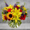 Beautiful and vibrant colors of alstroemeria, larkspur, spray roses, carnations, sunflowers, and