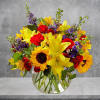 Beautiful and vibrant colors of alstroemeria, larkspur, spray roses, carnations, sunflowers, and