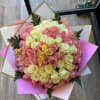 This bouquet has 75 roses, it is personalized (it has the letter