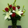 A simple yet extremely elegant arrangement. An assortment of fresh red roses
