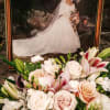 Beatify cascading bridal bouquet of stargazer lilies, roses ad other fllers