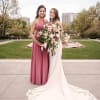 Beatify cascading bridal bouquet of stargazer lilies, roses ad other fllers