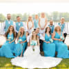 Azul blue and white roses and baby&#039;s breath round whimsical bouquets