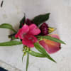 Beautiful sunset - orange mini calla lily and filler flowers boutonniere