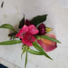 Beautiful sunset - orange mini calla lily and filler flowers boutonniere
