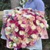 Bouquet of roses, peonies, spray roses, lisianthus and other flowers. 