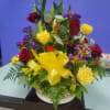 Wood basket of red &amp; yellow roses, lilies, 