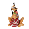 Mickey and Minnie Mouse&#039;s pet dog, Pluto the pup, holds a rosemaled
