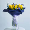 This bouquet is a celebration of contrasts and harmony! Vibrant yellow roses
