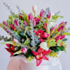 This bouquet is a joyful celebration of life, bursting with vibrancy and