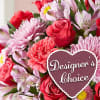 Florist choice Valentines Day arrangements made with variety of red, white, pink