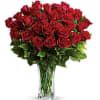 Sweep her off her feet with two dozen red roses in a