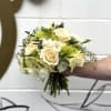 A harmonious blend of elegance and natural beauty, this bouquet features a