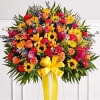 Standing basket arrangement with white roses, football mums, gladiola and carnations; lavender