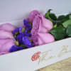 The ecstasy and charm of lavender roses fill the air with elation.