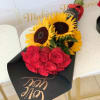 Indulge in luxury with our stunning Bouquet 24 Roses - 3 Sunflowers.