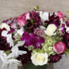 LUSH ASSORTMENT OF ROSES, PINK ASCLEPIAS, NUIT D&#039;ETE DAHLIAS, WHITE PHALAENOPSIS ORCHIDS