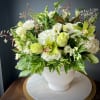Tastefully compact this full-bodied arrangement lends an air of sophistication no matter