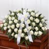 Our half casket cover, crafted with care and artistry by our expert