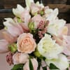 Elevate any setting with this exquisite arrangement featuring a harmonious blend of