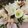 Elevate any setting with this exquisite arrangement featuring a harmonious blend of