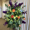 This stand spray is beautiful and rich with colors of orange, purple