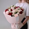 Bouquet of red roses, pink mini roses and dianthus.