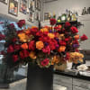 An amazing combination of imported roses, peonies, ranunculus, spray roses, hydrangeas, proteas