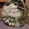 A memorial garden stone. Shown here with silk accents. (Not included) 