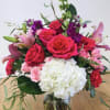 Assorted Pink Blooms In Roses, Spray roses, lilies, stock, and hydrangea, arranged