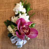 An elegant orchid will adorn your wrist with this bracelet corsage.