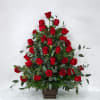 Beautiful roses adorn this series in a casket spray and pedestal arrangement